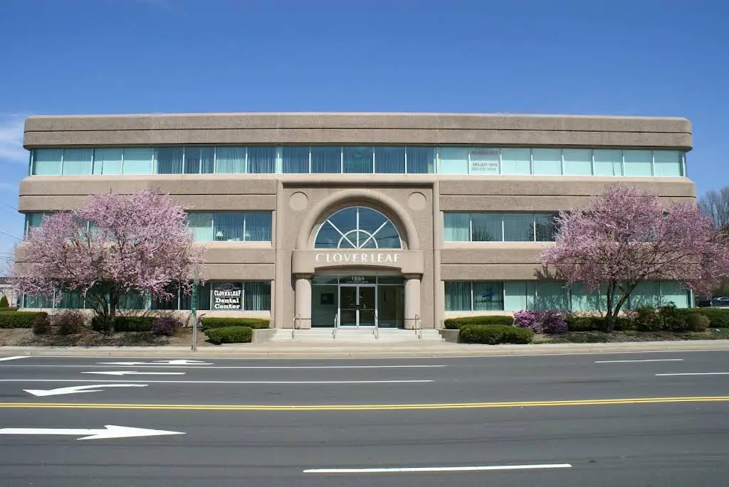 Cloverleaf Dental Center - Professional dental clinic exterior with modern facilities