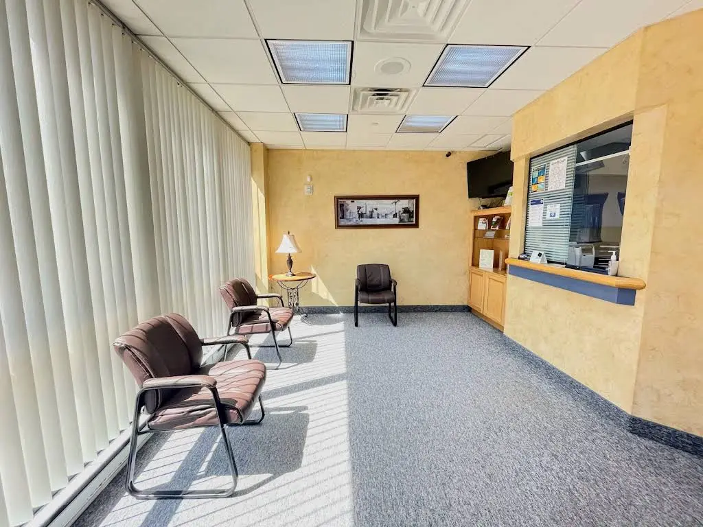Optimal Smiles - Professional dental clinic exterior with modern facilities