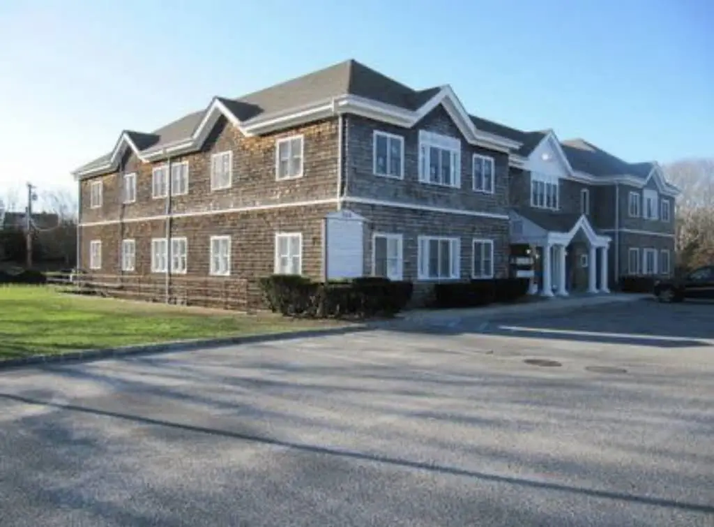 Hampton Implantology: Davis Gregory DMD - Professional dental clinic exterior with modern facilities