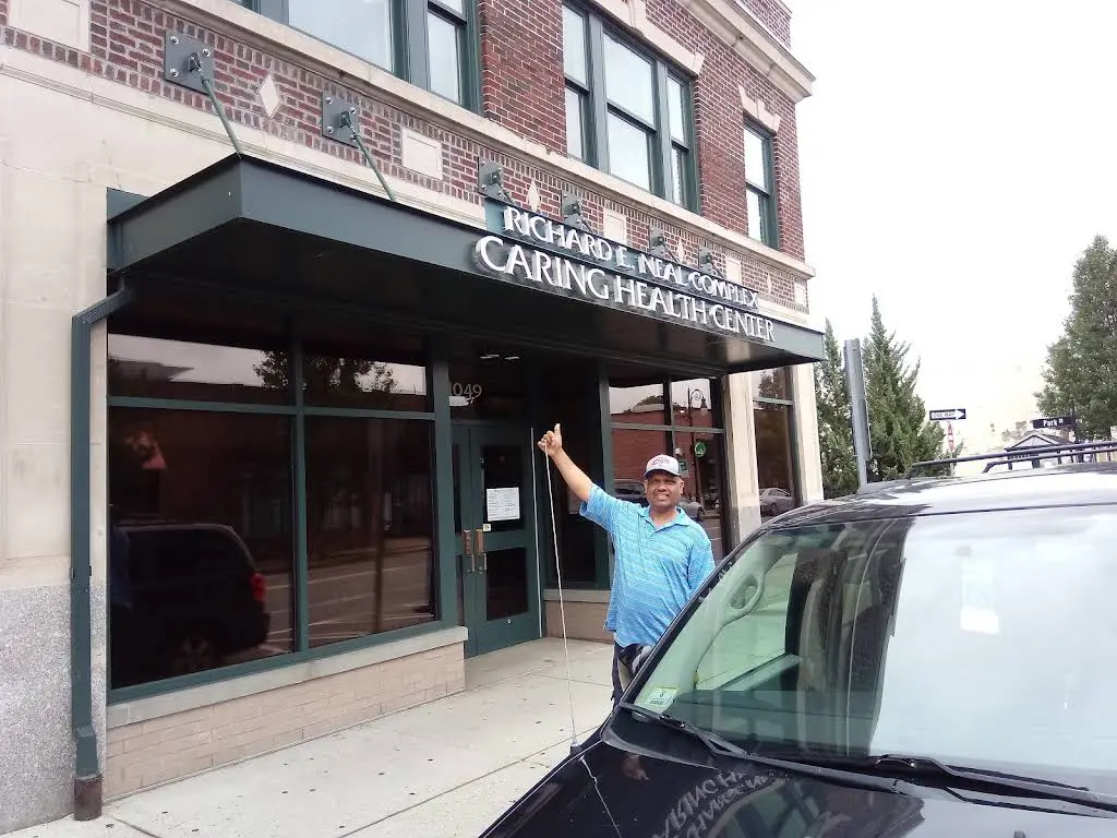Caring Health Centers - Professional dental clinic exterior with modern facilities