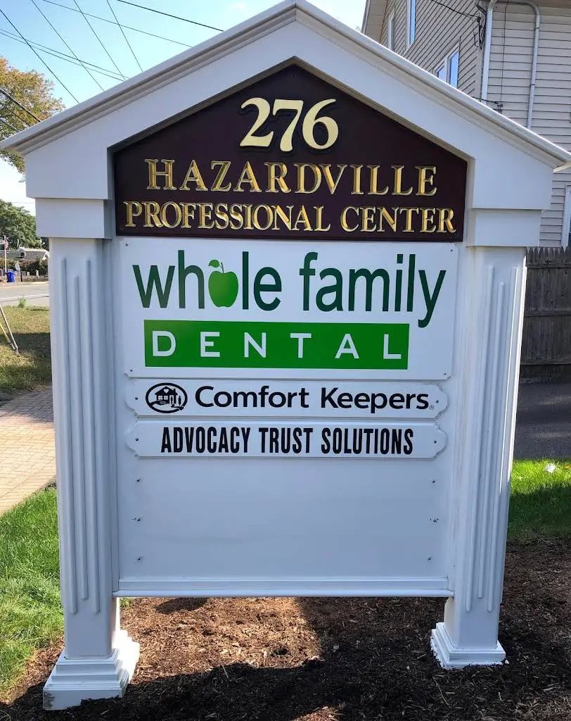 Whole Family Dental - Professional dental clinic exterior with modern facilities