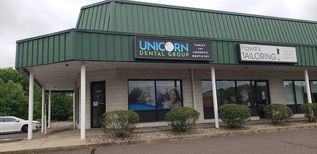 Unicorn Dental Group - Professional dental clinic exterior with modern facilities