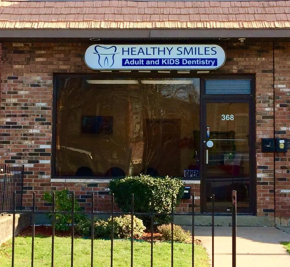 Healthy Smiles - Professional dental clinic exterior with modern facilities