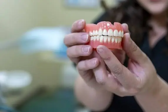 Affordable Dentures & Implants - Professional dental clinic exterior with modern facilities