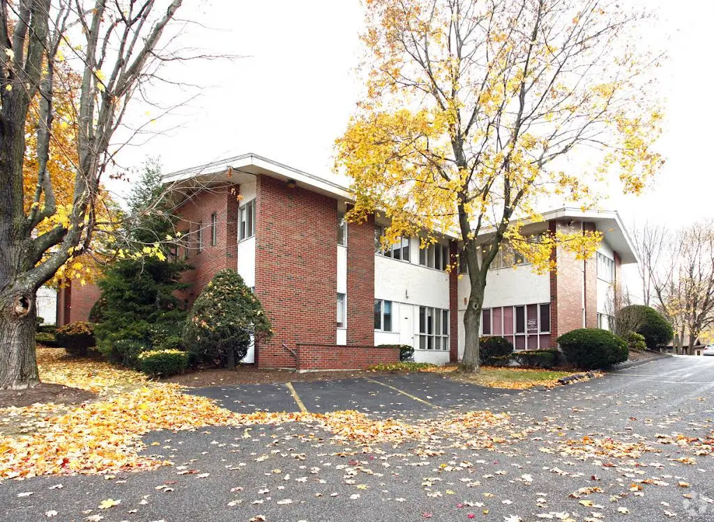 Framingham Dental Specialists - Professional dental clinic exterior with modern facilities