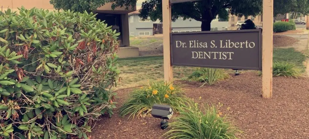 Elisian Complete Dentistry & Facial Aesthetics - Professional dental clinic exterior with modern facilities