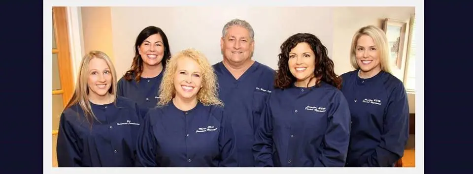 Smart Dental Network - Professional dental clinic exterior with modern facilities