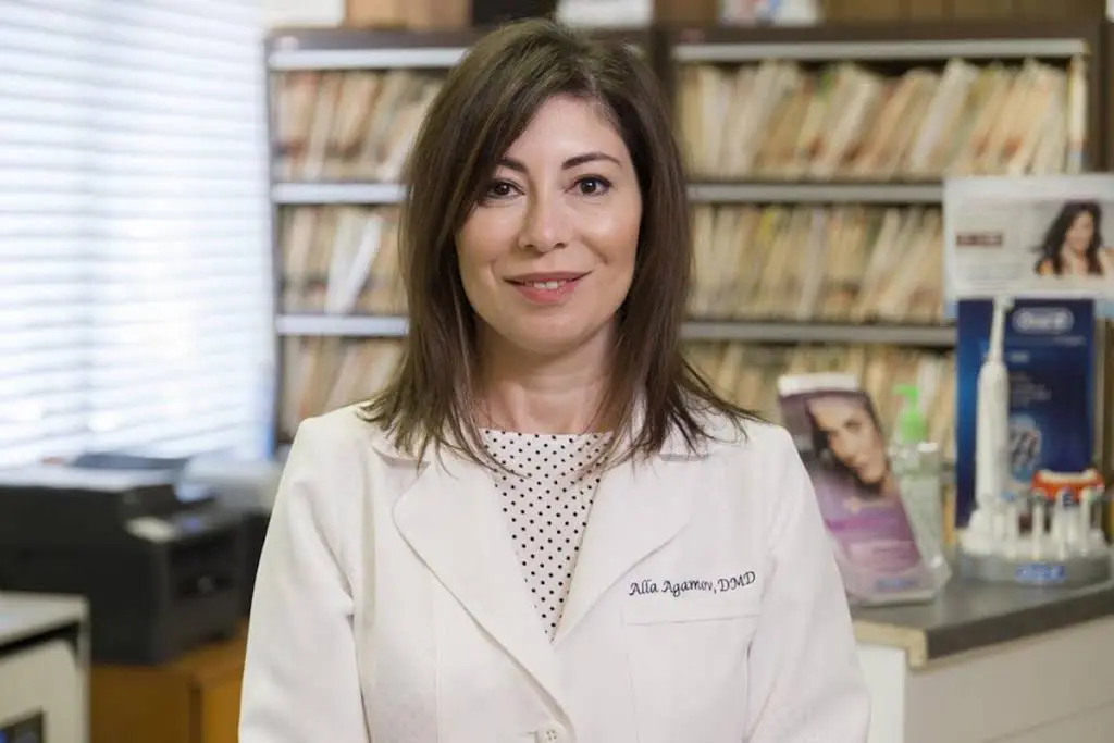 Alla Agamov, D.M.D. - Professional dental clinic exterior with modern facilities