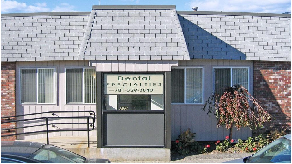 Dental Specialties - Professional dental clinic exterior with modern facilities