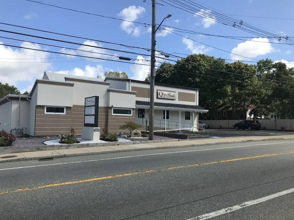 Q Smile Dental Spa - Professional dental clinic exterior with modern facilities