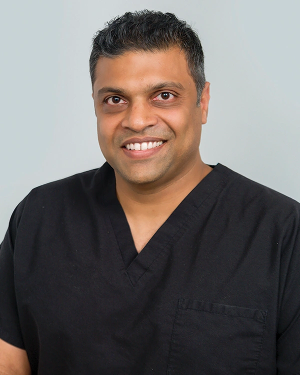 Oral Surgery & Implant Centers - Professional dental clinic exterior with modern facilities