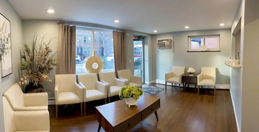 Elsa A. Guzman DMD - Caring Family Dental - Professional dental clinic exterior with modern facilities