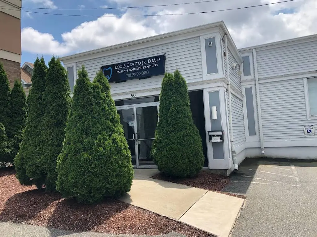 Louis DeVito Jr. DMD - Professional dental clinic exterior with modern facilities