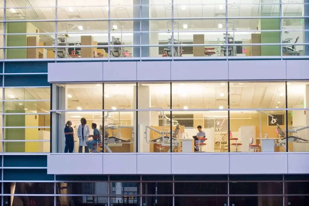 Tufts University School of Dental Medicine - Professional dental clinic exterior with modern facilities