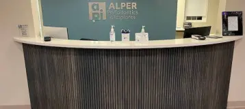 Alper Periodontics & Implants