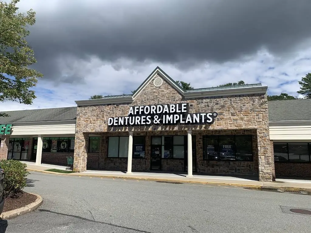 Affordable Dentures & Implants - Professional dental clinic exterior with modern facilities