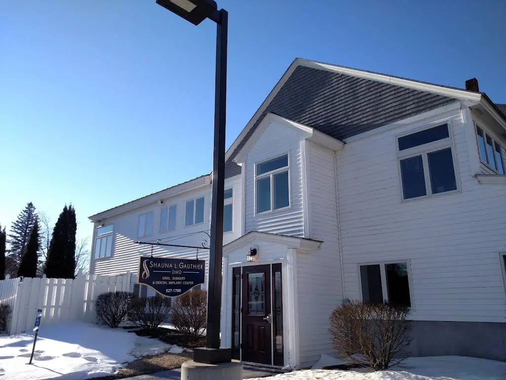 Oral Surgery of New England & Dental Implant Center - Professional dental clinic exterior with modern facilities