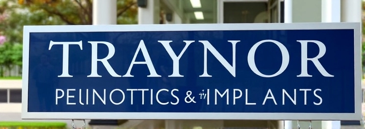 Traynor Periodontics & Implants - Professional dental clinic exterior with modern facilities