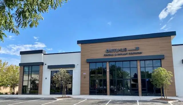 DNTL Hub - Professional dental clinic exterior with modern facilities