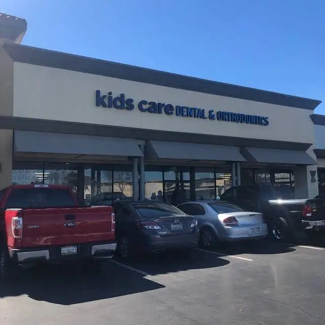 Kids Care Dental & Orthodontics - Professional dental clinic exterior with modern facilities