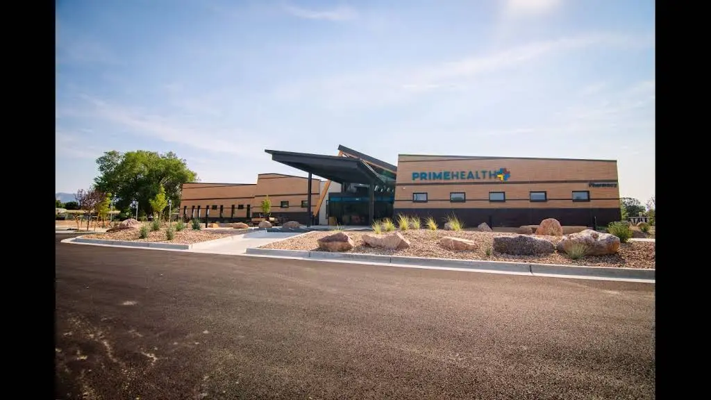 PrimeHealth+ - Professional dental clinic exterior with modern facilities