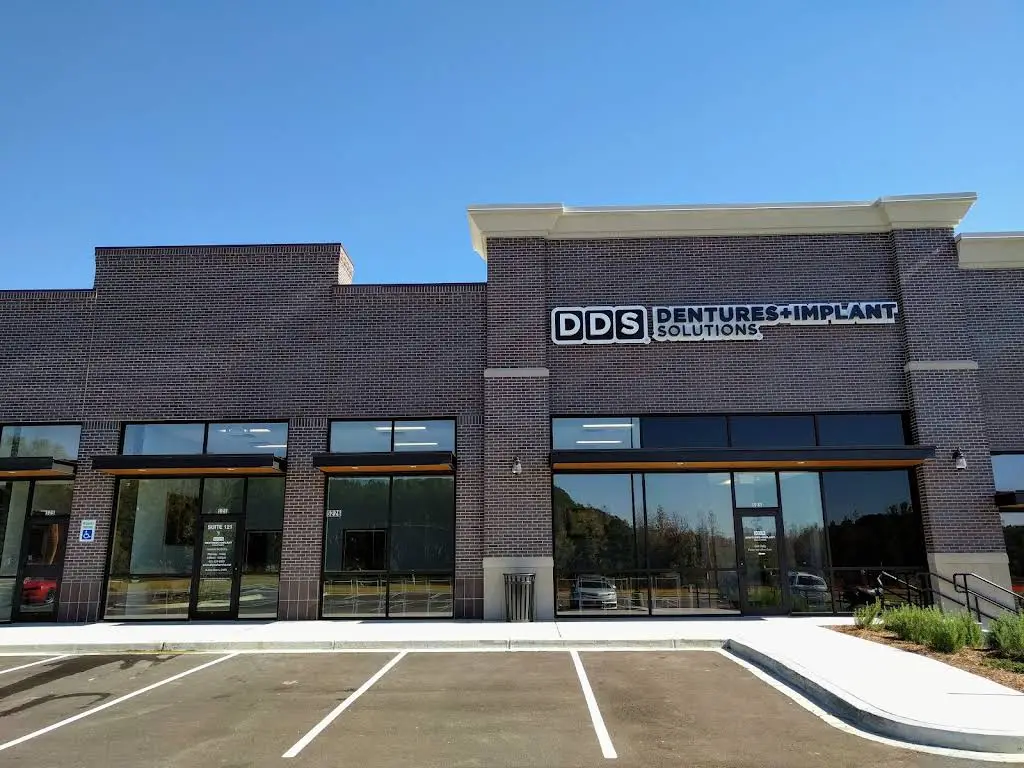 Affordable Dentures & Implants - Professional dental clinic exterior with modern facilities