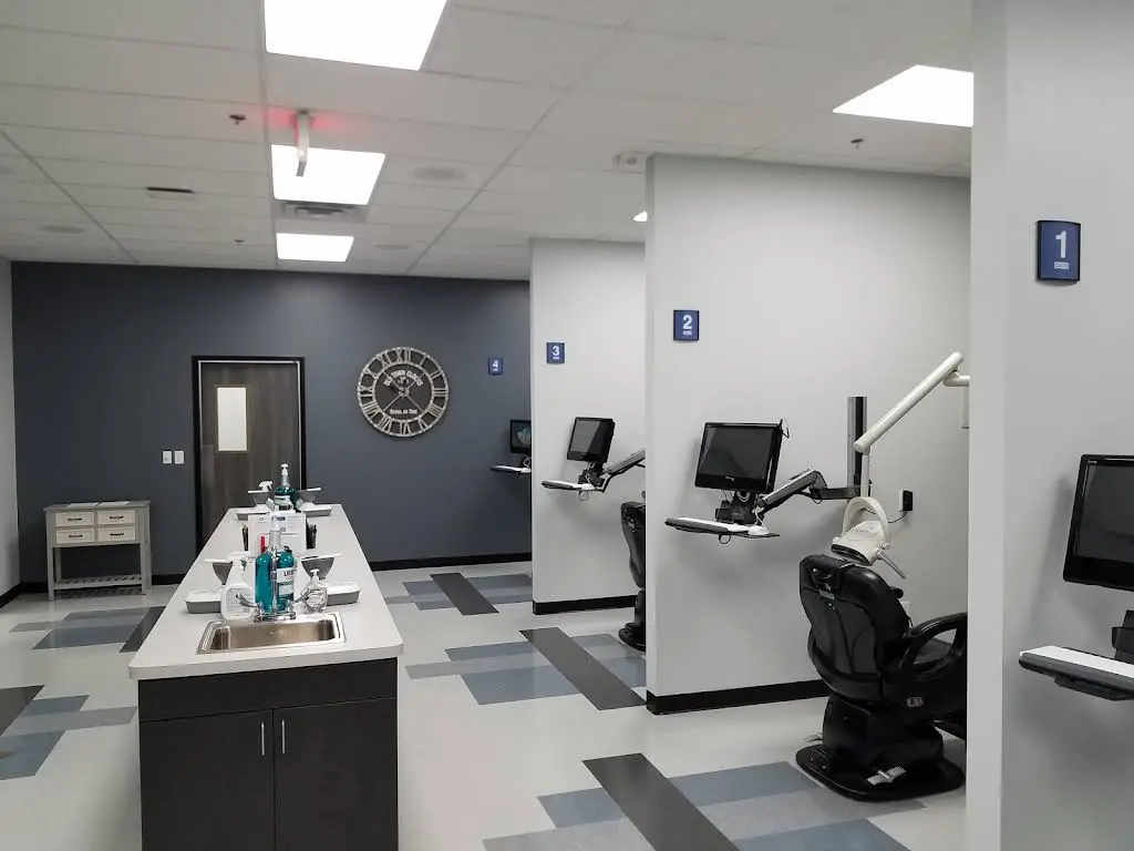 Affordable Dentures & Implants - Professional dental clinic exterior with modern facilities