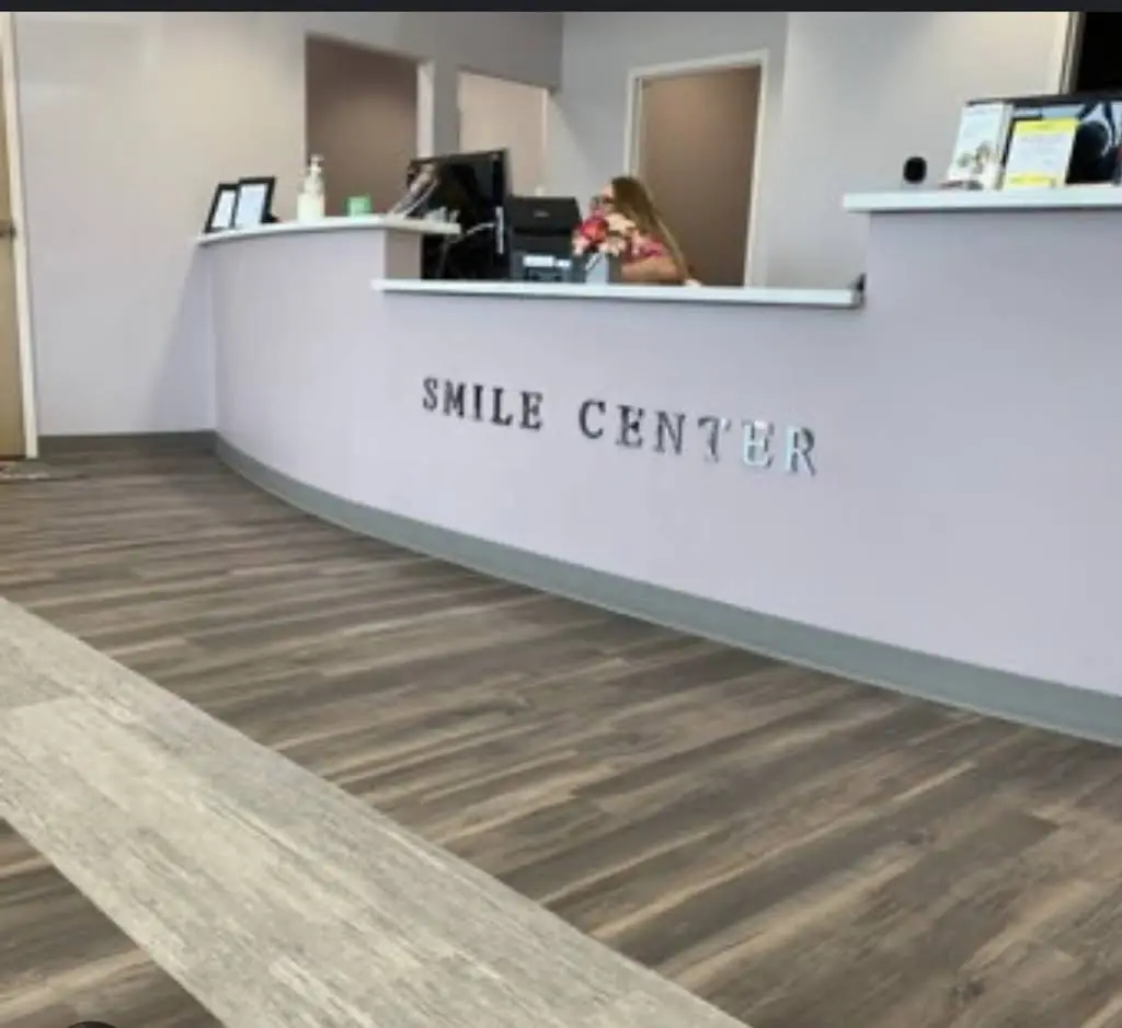 Smile Center - Professional dental clinic exterior with modern facilities
