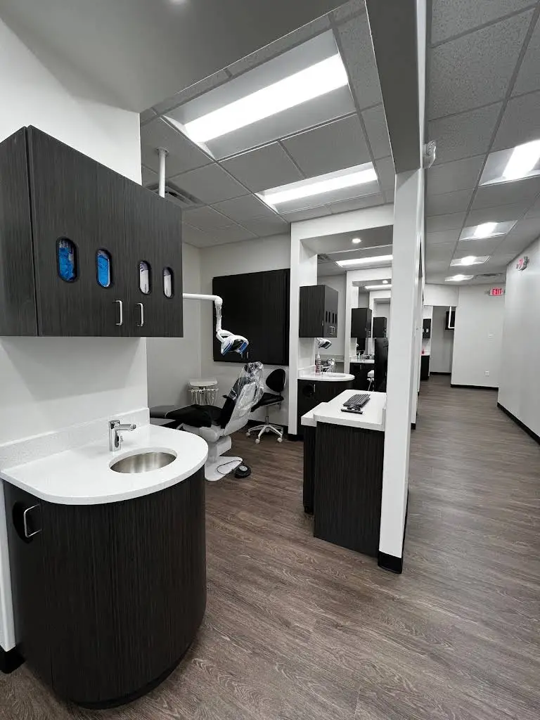 DentFirst Dental Care - Professional dental clinic exterior with modern facilities