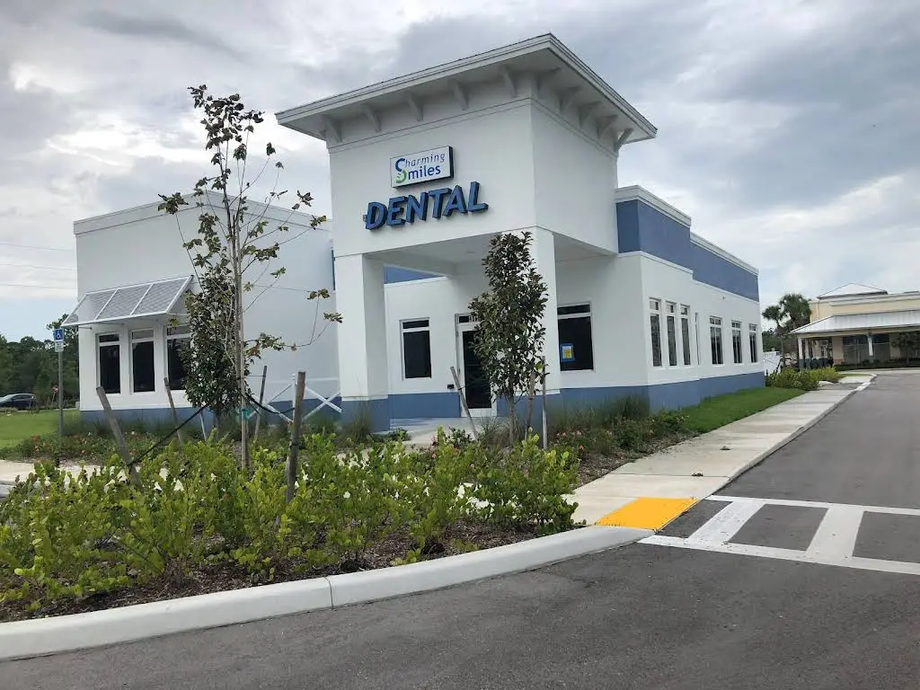 Charming Smiles - Professional dental clinic exterior with modern facilities
