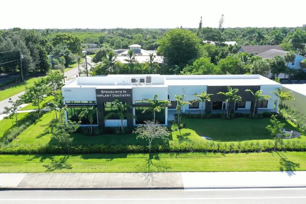 Specialists in Implant Dentistry - Dr. Matthew Holtan - Professional dental clinic exterior with modern facilities