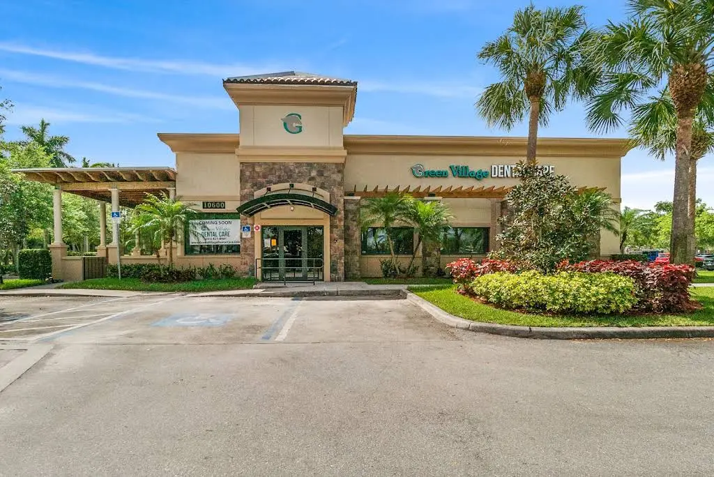Green Village Dental Care - Professional dental clinic exterior with modern facilities