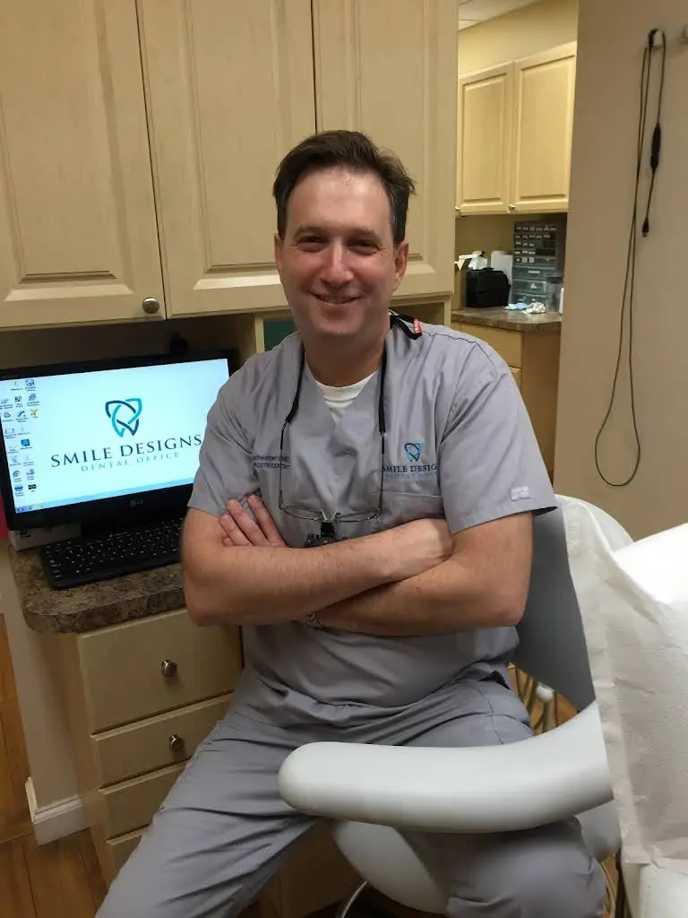 Smile Designs - Professional dental clinic exterior with modern facilities