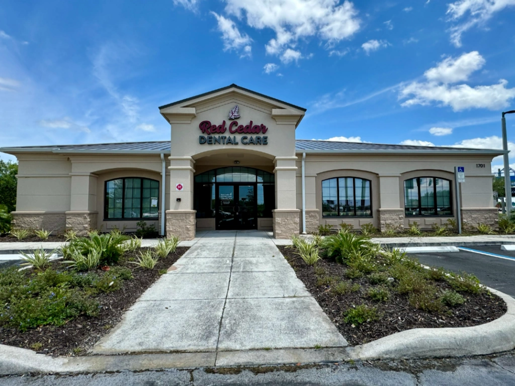 Red Cedar Dental Care - Professional dental clinic exterior with modern facilities