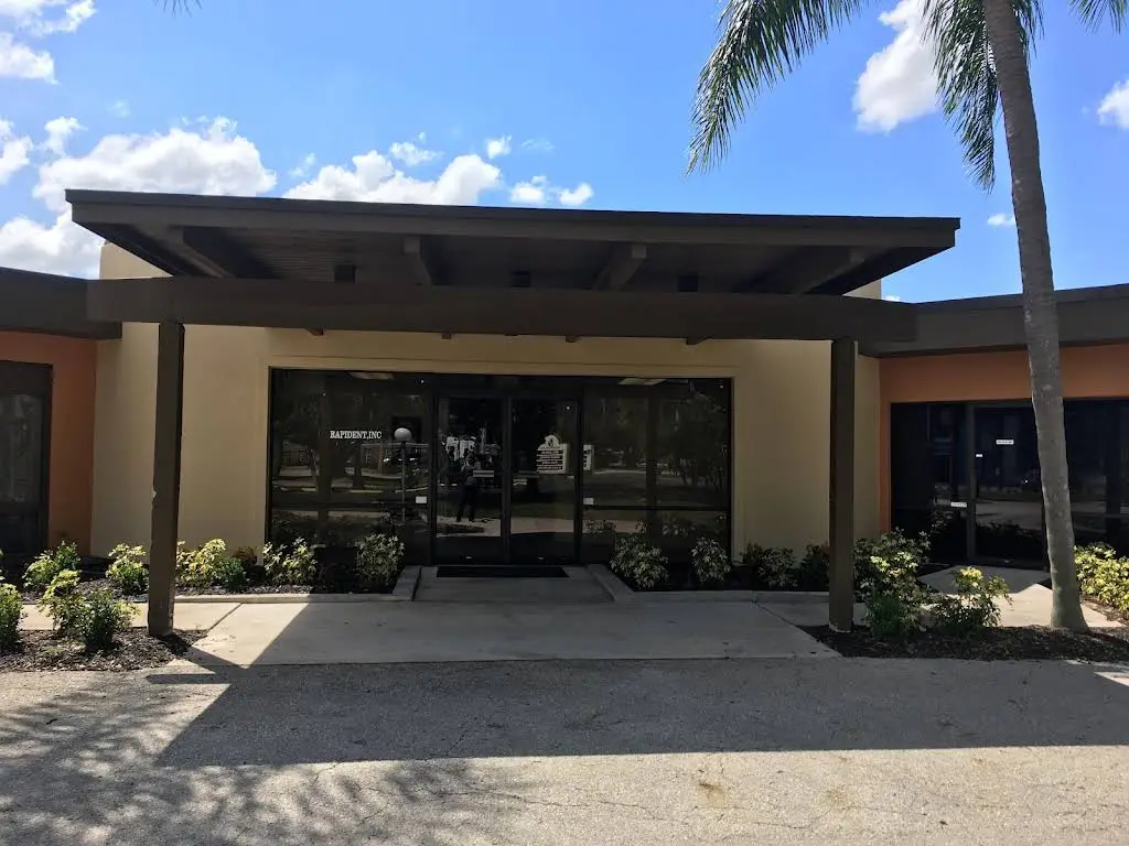 Rapident Inc - Professional dental clinic exterior with modern facilities