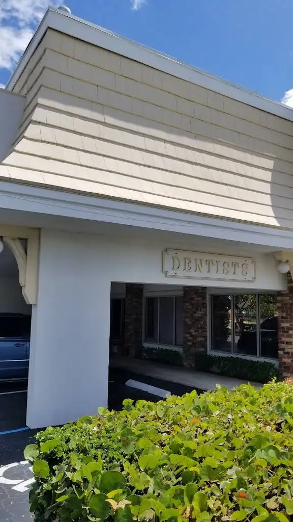 Designer Dentistry - Professional dental clinic exterior with modern facilities