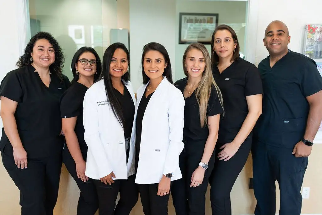 Palm Beach Implant and Cosmetic Solutions - Professional dental clinic exterior with modern facilities