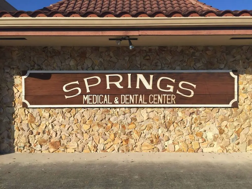 Listopad & Finder DDS - Professional dental clinic exterior with modern facilities