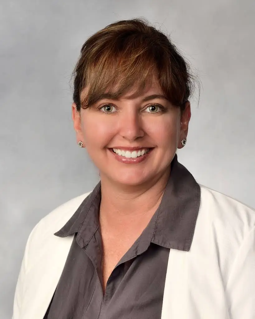 Jaline Boccuzzi, DMD, AAACD, PA / JBDentistry - Professional dental clinic exterior with modern facilities
