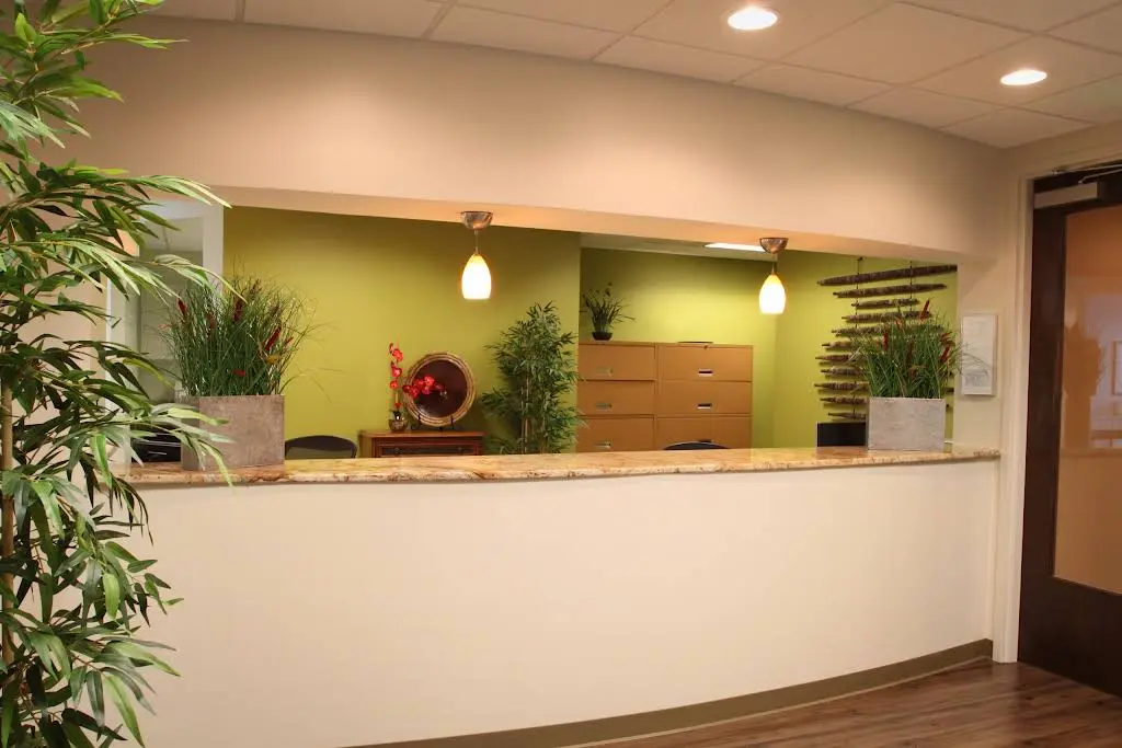Dr. John Stone, DDS - Professional dental clinic exterior with modern facilities