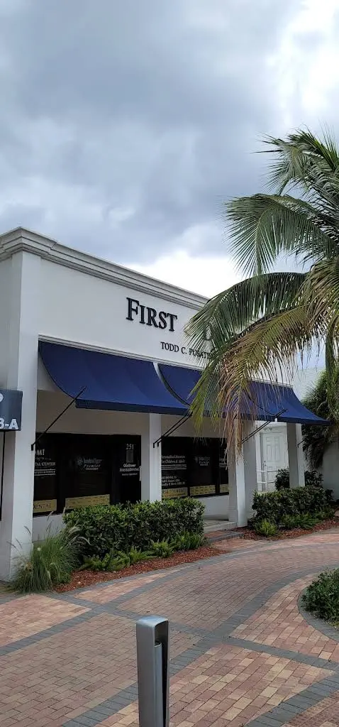 First Dental - Professional dental clinic exterior with modern facilities