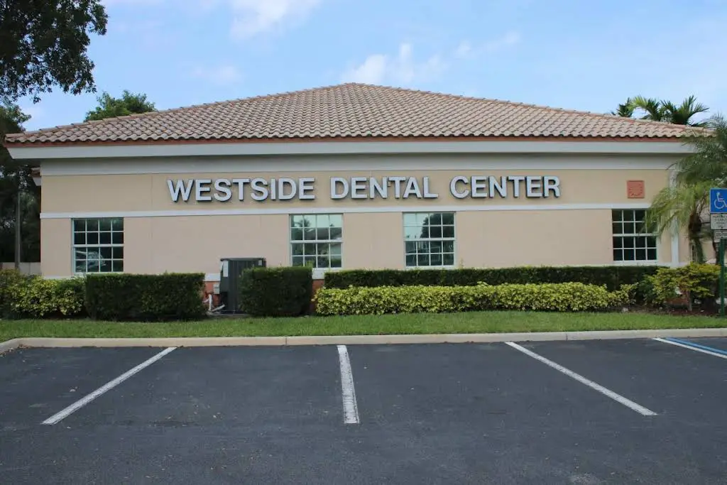 Westside Dental Center: Uttma Dham, DMD - Professional dental clinic exterior with modern facilities