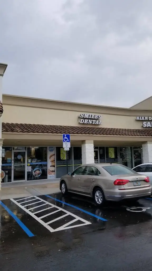 Smiles by Design, Inc. - Professional dental clinic exterior with modern facilities