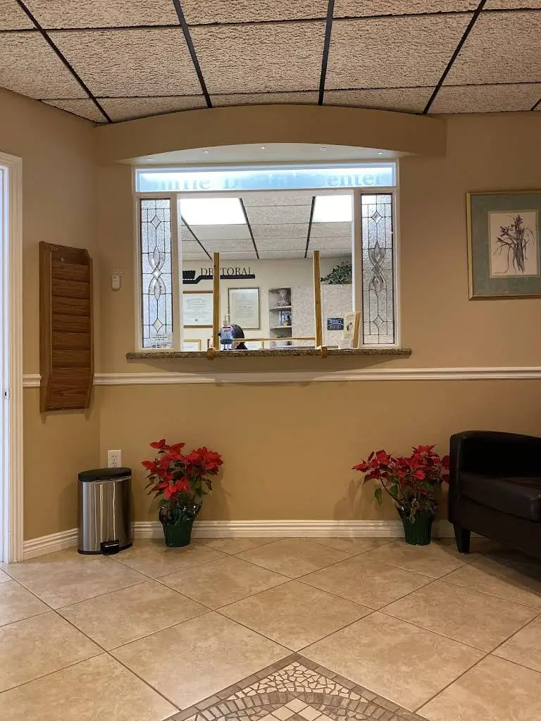Dr. Armando Toral, DMD - Professional dental clinic exterior with modern facilities