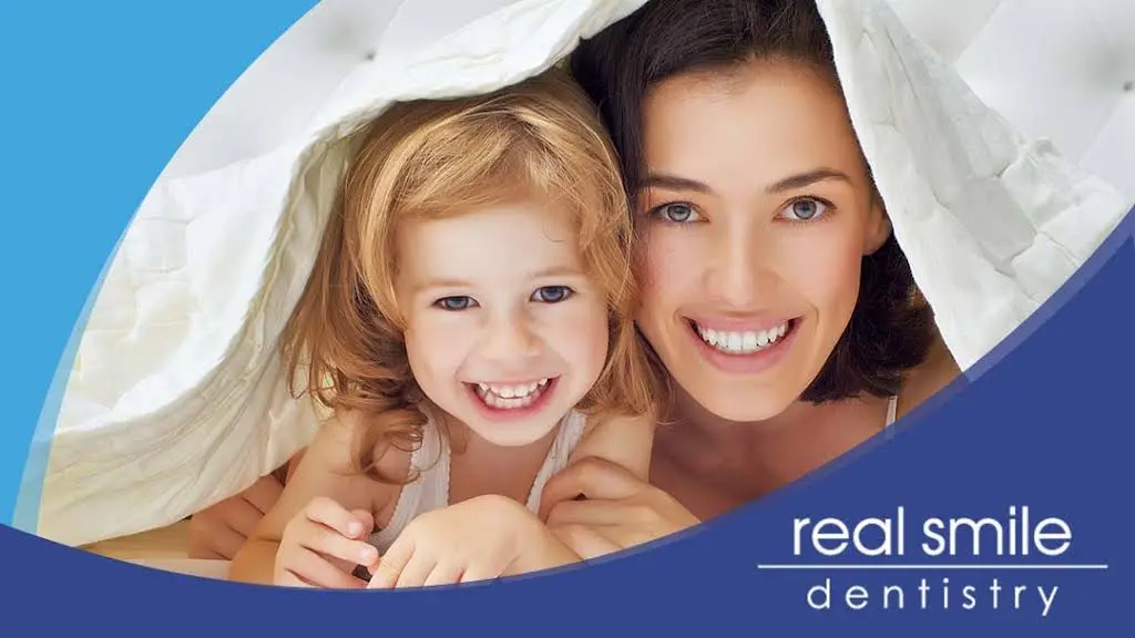 Real Smile Dentistry - Professional dental clinic exterior with modern facilities