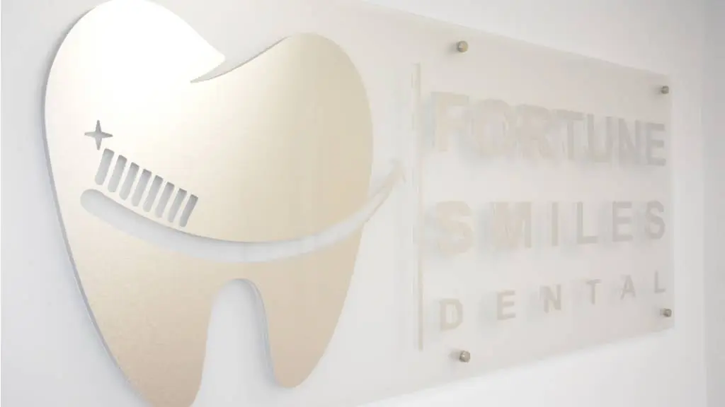 Fortune Smiles Dental - Professional dental clinic exterior with modern facilities