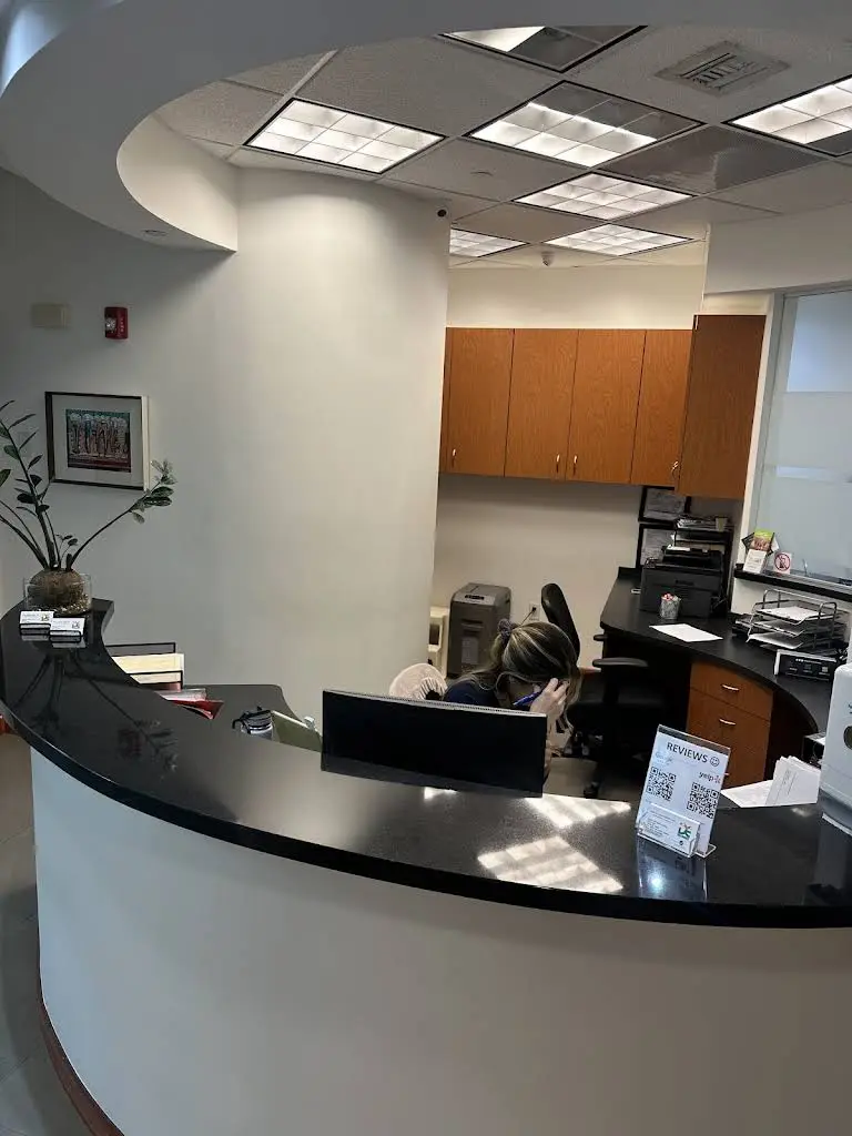 JUAN G. LLANO D.M.D., P.A. - Professional dental clinic exterior with modern facilities