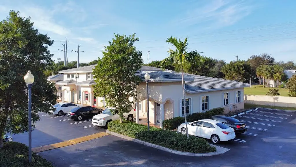 Sunset Smile Creations - Kendall - Professional dental clinic exterior with modern facilities