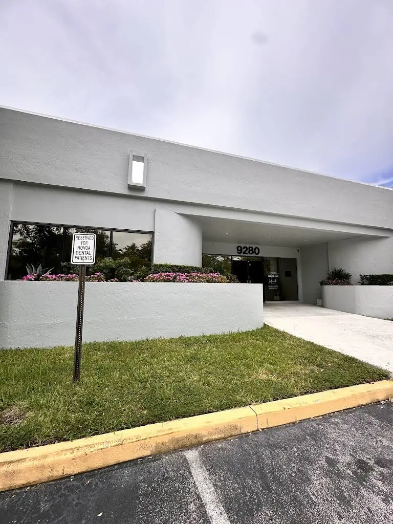 Novoa Dental Associates - Professional dental clinic exterior with modern facilities