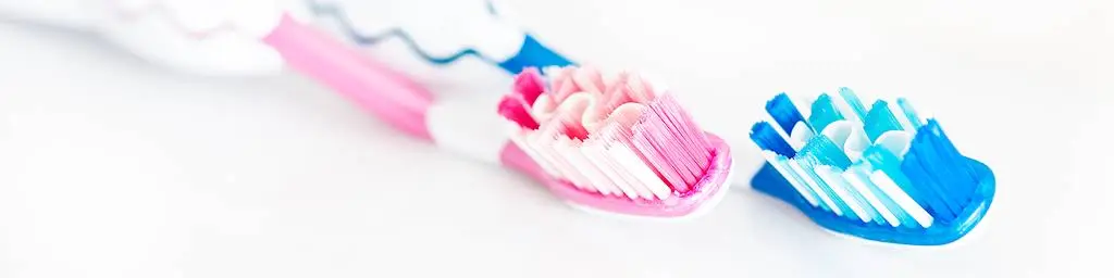 All About Smiles Dental Center - Professional dental clinic exterior with modern facilities